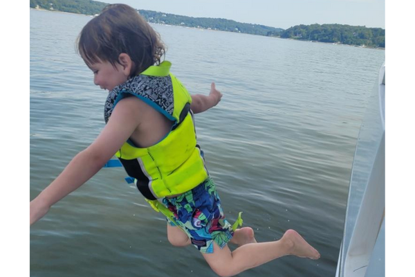 Kiddo jumping off a boat