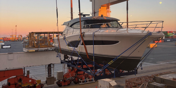 Riviera being loaded on a ship
