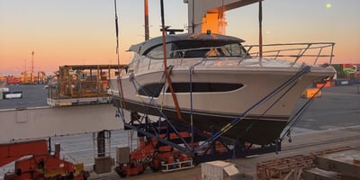 Riviera being loaded on a ship