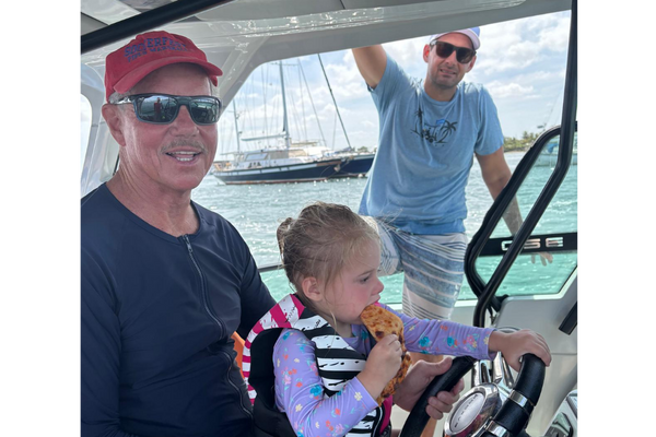 Who says boating is hard.I can eat pizza and drive the boat at the same time and I am only 2